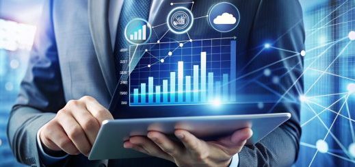 businessman using tablet with digital graphics.